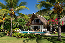 Das Ferienhaus Coconut Casa in Fluorida ist eine kleine spitze Hütte umgeben von Kokospalmen